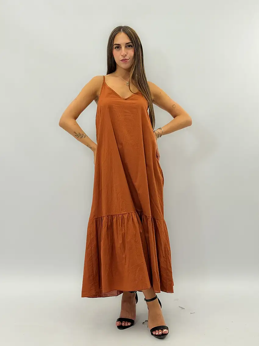 Abito a tinta unita con scollo a V