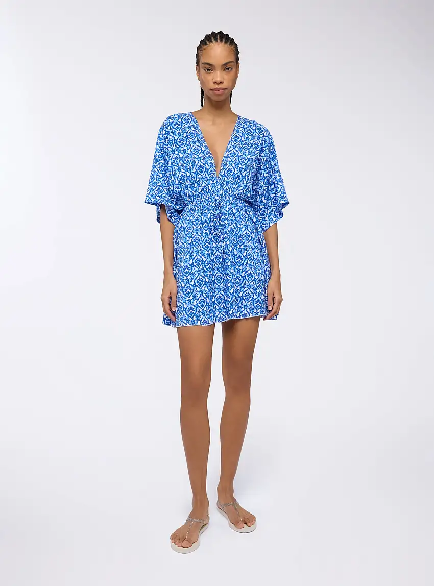 Vestito fantasia etnica con scollo v Var bianco ottico